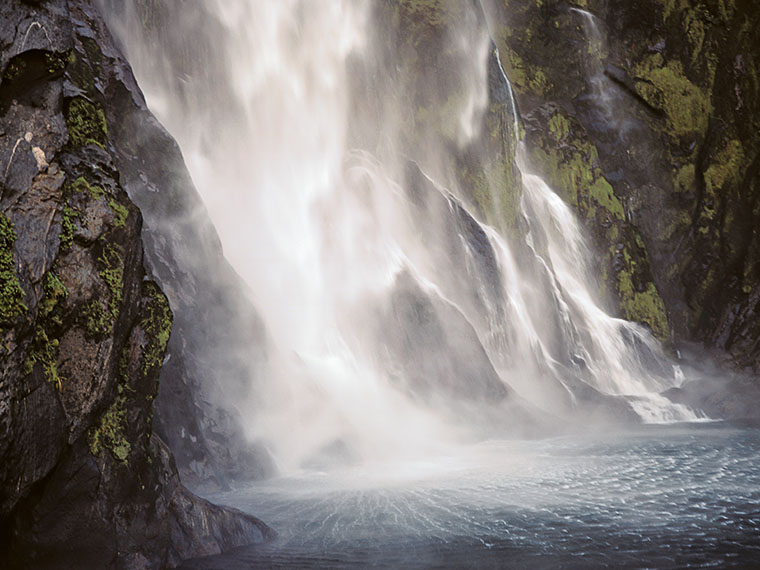 Sterling Falls in Milford Sound is quite impressive (and loud) when your tour boat captin moves in close.
